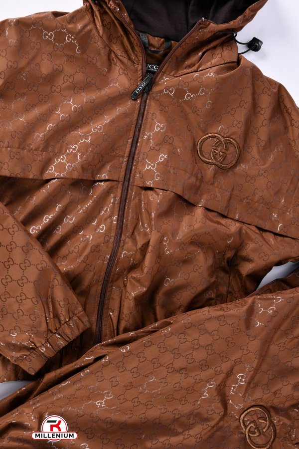 Костюм жіночий (кол. шоколадний) з плащової тканини  Розміри в наявності : 42, 44, 50 арт.22-2572