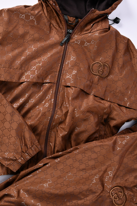 Костюм жіночий (кол. шоколадний) з плащової тканини  Розміри в наявності : 42, 44, 50 арт.22-2572